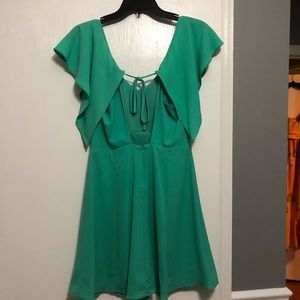 Sea foam ruffled tie back dress